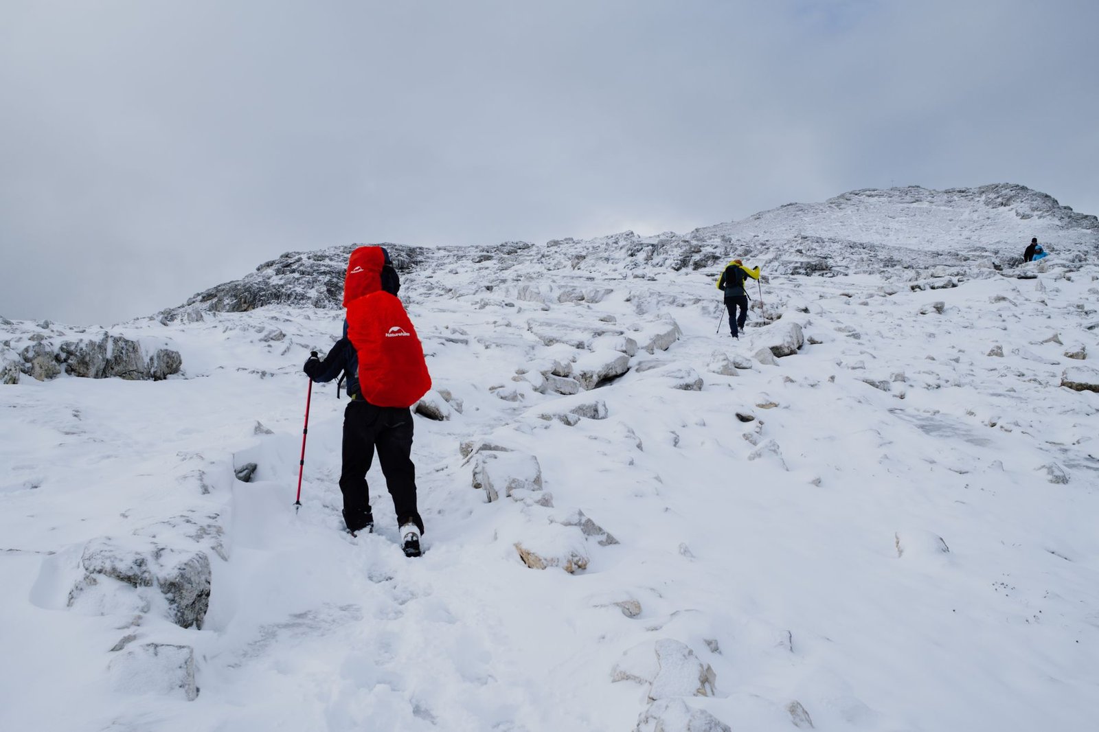 Hikers ascending a snowy trail in San Martino di Castrozza, Trentino, Italy – Dry Bags and Stuff Sacks
